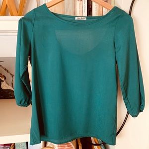 Emerald green blouse with open back